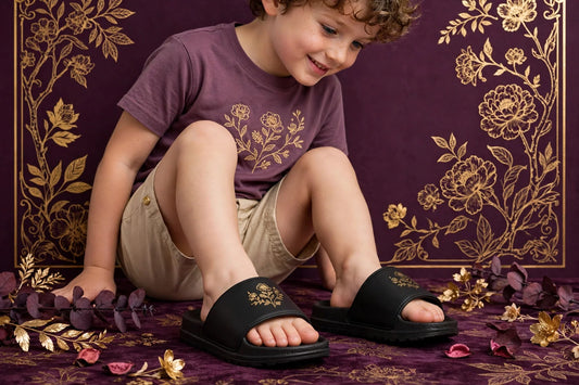 Child wearing Black Kids Slide Sandals